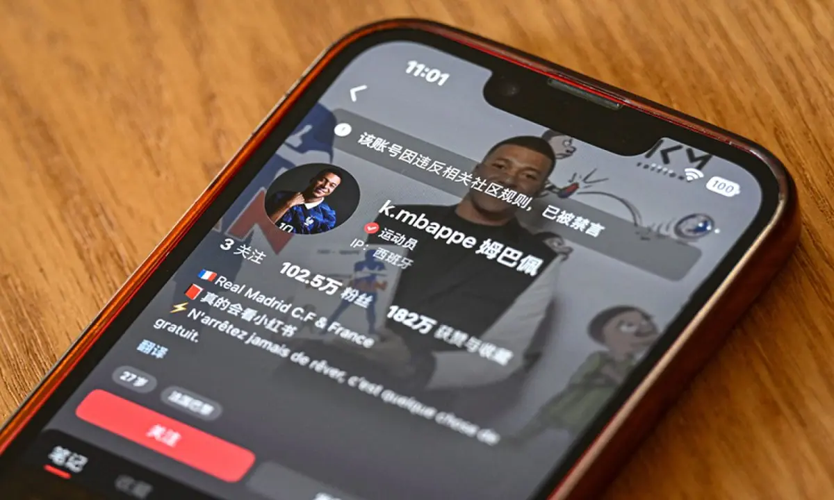 This photo illustration shows French football star Kylian Mbappe’s Chinese social media Rednote account displaying the message: “This account has been muted for violating community guidelines”, in Shanghai, China, on October 28, 2026. —AFP