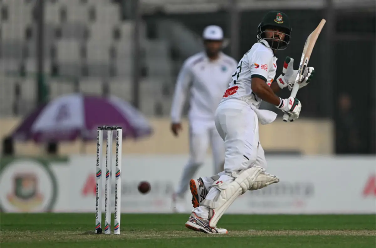  Bangladesh opener Shadman Islam watches the ball after playing a shot during the first Test against the West Indies at the Sher-e-Bangla National Stadium on Wednesday.&mdash;AFP 