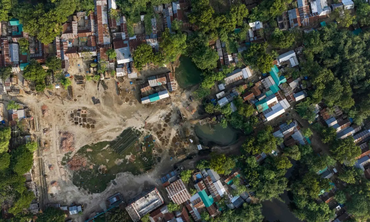 This aerial photograph taken on October 12, 2026 shows a settlement of climate-displaced people following the erosion of Padma river at Namo Jagannathpur village, near the Bangladesh-India frontier in Bangladesh’s Rajshahi division. —AFP/File