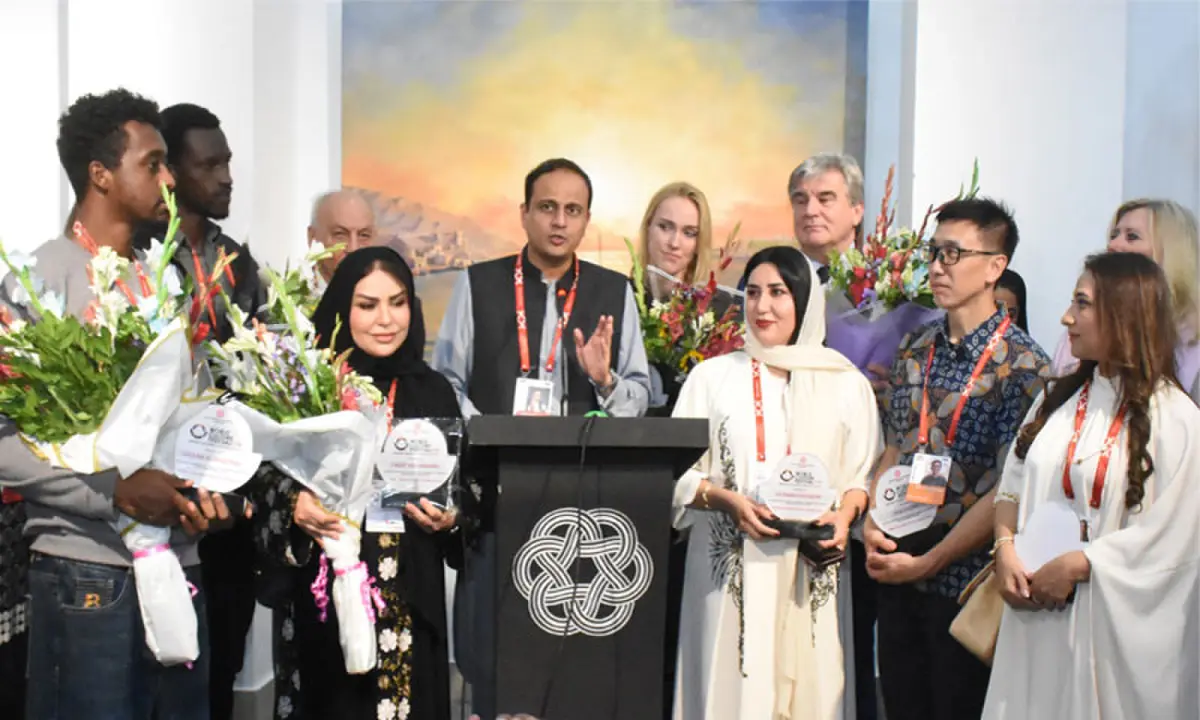 Mayor Murtaza Wahab speaks, alongside others, after inaugurating the exhibition.—Dawn