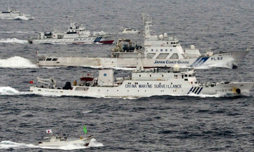 Japan vows to use force if Chinese land on islands