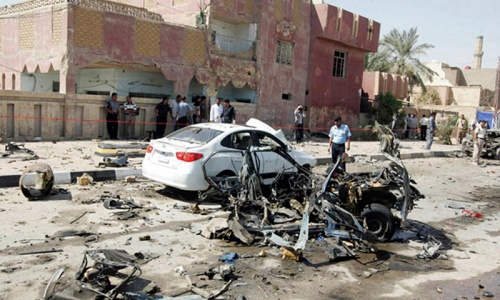 Wave of bombings kills 65 in Baghdad province