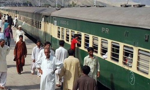 Nine killed as train hits rickshaw Nine killed as train hits rickshaw