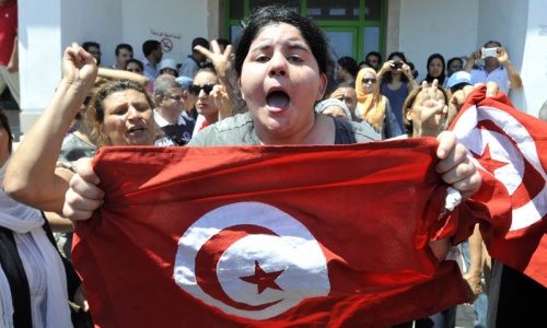 Turmoil hits Tunisia after secular politician slain Turmoil hits Tunisia after secular politician slain