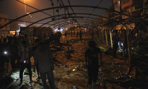 Assault on Iraq funeral, other attacks kill 96