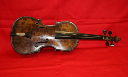 Violin that played as Titanic sank sells for record $1.5 million