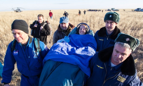 ISS crew returns safely to Earth with Olympic torch