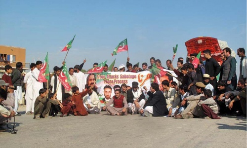 PTI activists search trucks for Nato supplies