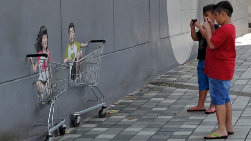 Lithuanian 'Banksy' a hit in anti-graffiti Singapore