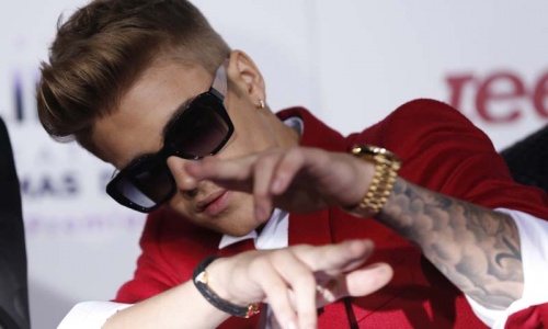 Justin Bieber arrested for drag racing while intoxicated