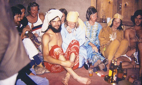 A group of hippie travellers enjoying Pakistani beer at a rest house in North Pakistan, 1974. - Photo from the official Hippie Trail facebook and Flickr accounts.