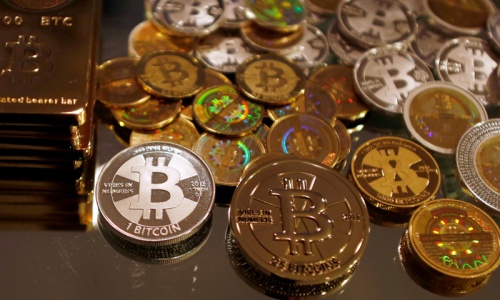Mt. Gox files for bankruptcy, hit with lawsuit