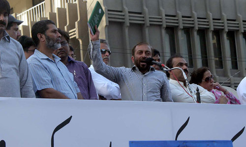 MQM stages protest against extra-judicial killing of workers