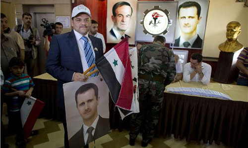 Polls open in Syrian presidential election