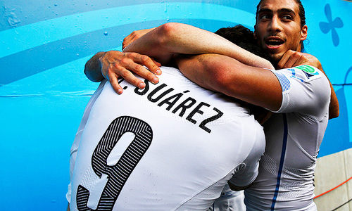 Suarez 'bite' storm as Uruguay sink Italy