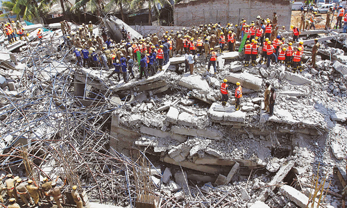 Building collapses in India; 11 killed