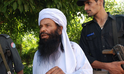 This photograph shows arrested cleric Ilyas Qadri, the so-called spiritual healer of drug addicts as he speaks with AFP at a police station in Haripur, some 70 kilometres north of Islamabad. — Photo by AFP 