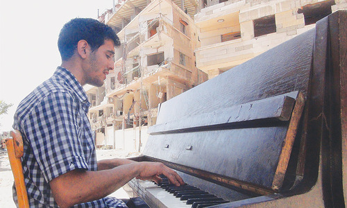 In Syria’s starving Yarmuk camp, a pianist conjures up hope