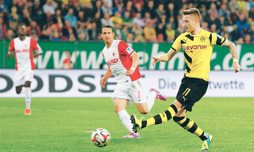 Reus sparkles as Dortmund claim first Bundesliga win