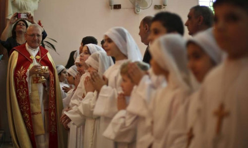 Amid exodus, a few thousand Christians resolve to stay back in Syria