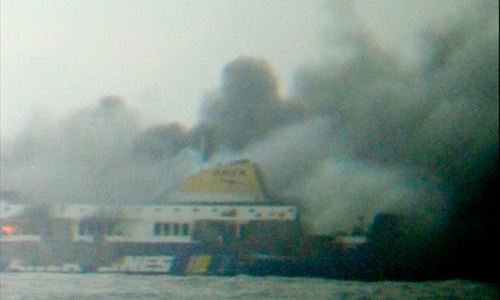 Ferry burns in Adriatic; rough seas slows rescue