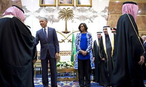 Michelle Obama draws flak for going without headscarf in Saudi Arabia