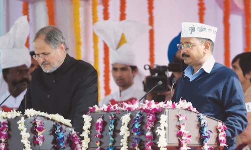 Kejriwal takes oath as CM, tells people to take pictures after bribing officials