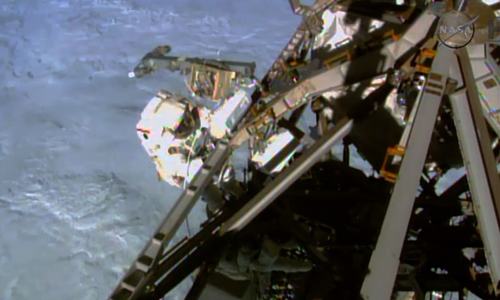 Spacewalking astronauts finish extensive, tricky cable job