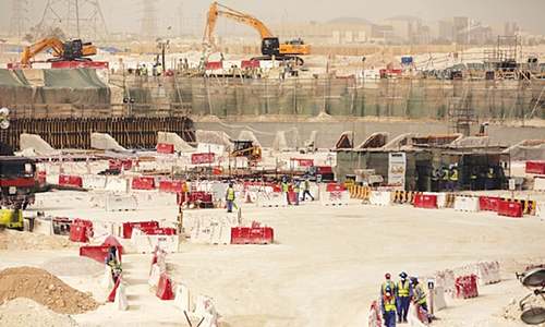 How have conditions for migrant workers in Qatar changed in nine key areas?