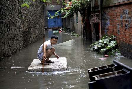 Heavy rains in southern China kill 18, leave 4 missing