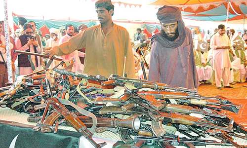 Over 400 militants surrender