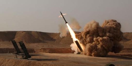 Iran unveils new missile, says seeks peace through strength