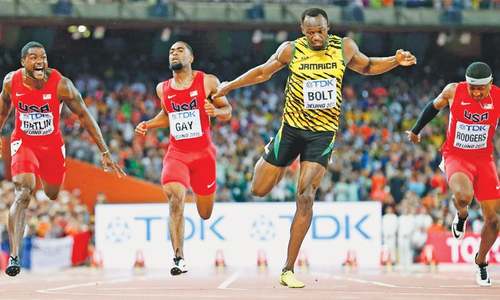 Supreme Bolt holds off Gatlin in 100m thriller
