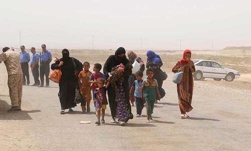 Fleeing Islamic State killings in Syria, a family reaches Bavaria