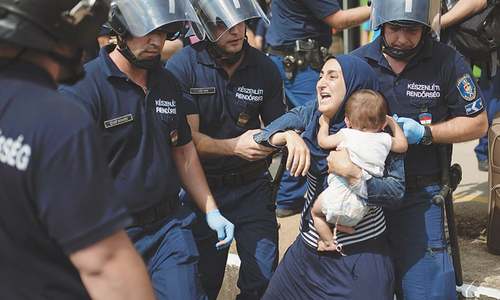 Photos of child&rsquo;s body washed ashore shock world as refugee crisis grows