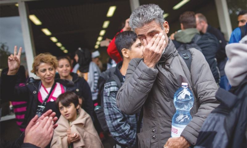 Struggling Germany urges neighbours to do more to ease refugee crisis Struggling Germany urges neighbours to do more to ease refugee crisis