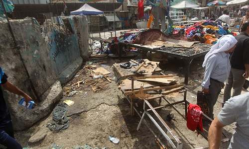 IS-claimed suicide blasts kill 21 in Baghdad