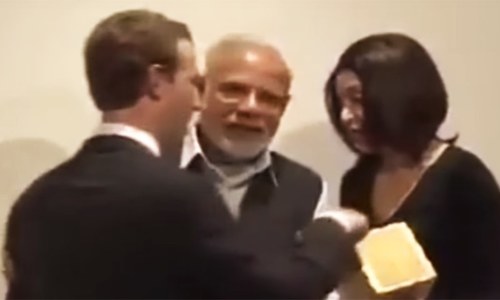 By pulling Zuckerberg aside, Modi demonstrated that he always knows where the camera is
