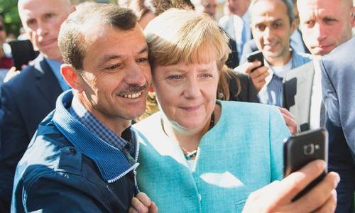 Under fire in refugee crisis, Germany&rsquo;s Merkel goes on offensive
