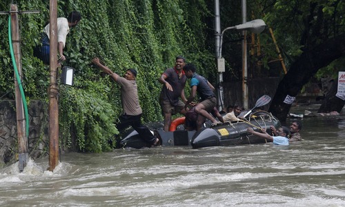 Flood waters swirl in south India even as rain eases