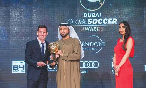 Messi, Barcelona win awards in Dubai