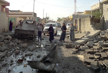 Two Iraqi mosques targeted in bombings Two Iraqi mosques targeted in bombings