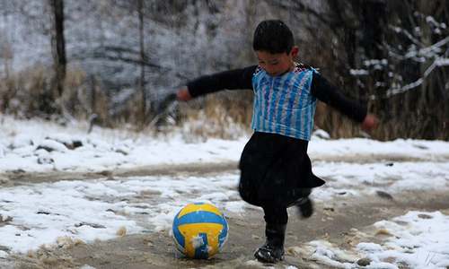 Afghan boy becomes Internet star after plastic shirt goes viral