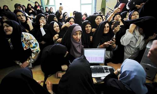 Why vote? Iran's women and youth disillusioned in run-up to parliamentary polls