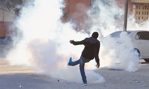 Bahrain protesters clash with police on uprising anniversary