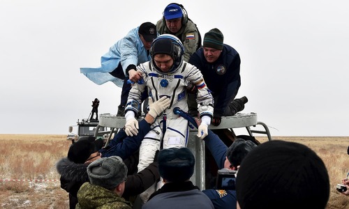 International Space Station's 'one year crew' returns to Earth