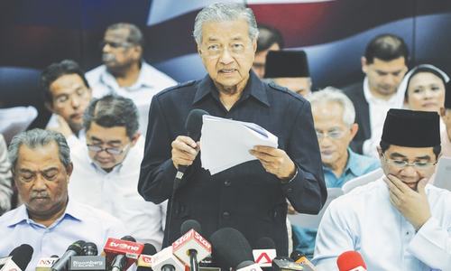 Mahathir joins hands with old rivals to oust PM Razak