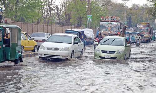 Rain turns roads, streets into rivulets in Peshawar Rain turns roads, streets into rivulets in Peshawar
