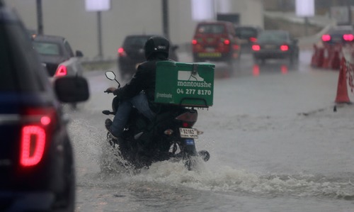 Heavy rains pause Abu Dhabi flights, close Emirates schools