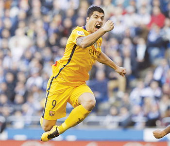 Suarez hits four in 8-0 Barca rout